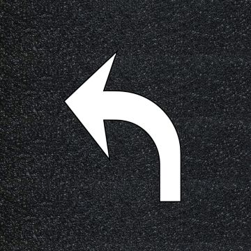 White preformed thermoplastic left turn arrow pavement marking on asphalt background, 2-piece FHWA left turn symbol