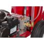 Detailed view of the pressure pump system on the Newstripe 4250 showing hose and brass fittings

'
