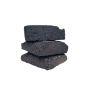 Close up of ready-to-heat asphalt bricks for pothole repair and asphalt patching.'