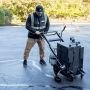 Filling cracks with the RY10 Pro Crackfill Melter Applicator and Deery crack sealant'