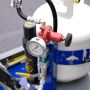 Detailed view of the propane regulator and pressure gauge on a RynoWorx infrared asphalt heater'