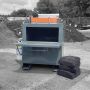MR2X2 Mini Asphalt Recycler with asphalt block positioned on the open tray, ready for heating'