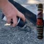 Tru Tack Cold Joint Sealer being sprayed on an asphalt edge'